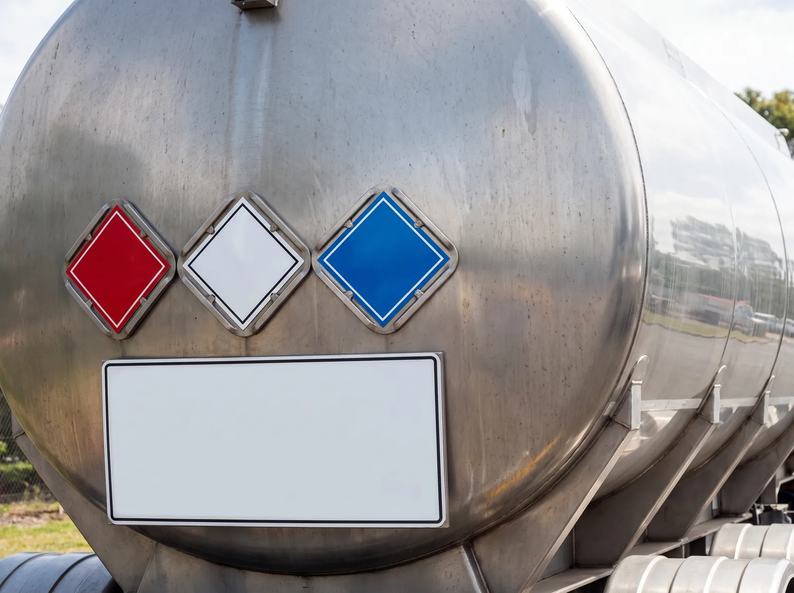Rear of a dangerous goods tanker showing hazard placards